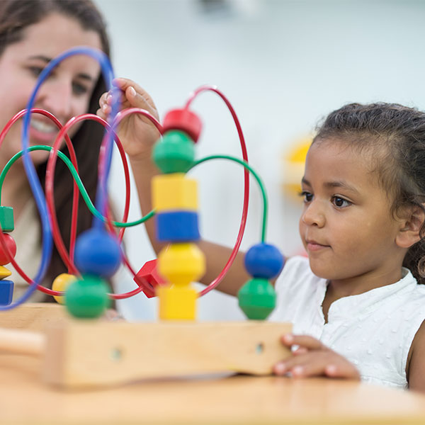 adult and child in school
